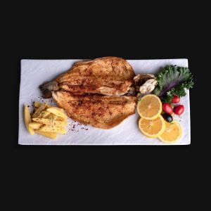 ۹۰۰گرم ماهی قزل آلا، دورچین سبزیجات، لیمو، سیر ترشی